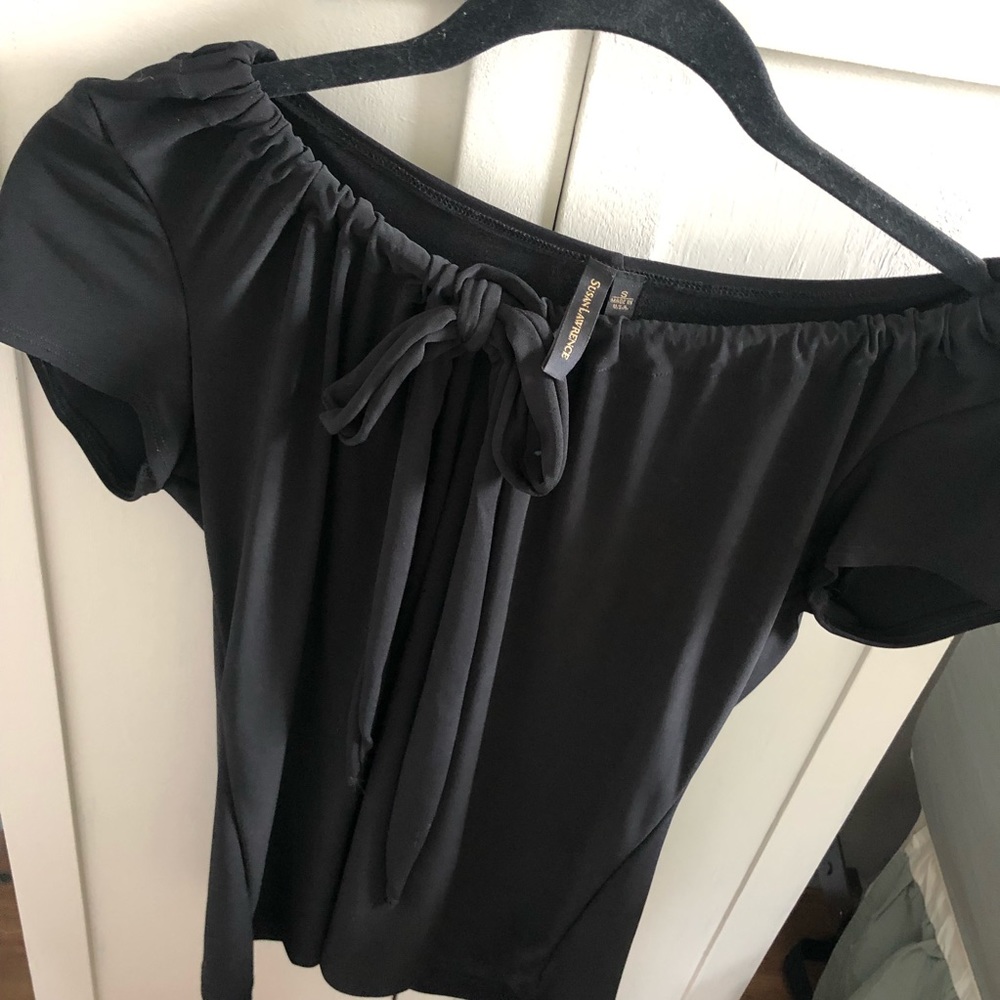 Susan Lawrence ........ black tie top